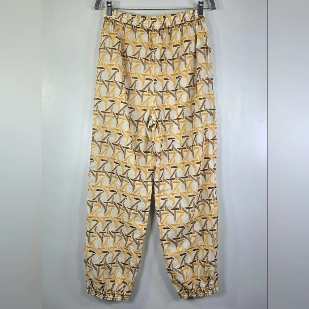 TORY BURCH BASKETWEAVE EMBROIDERED ANKLE PANTS.